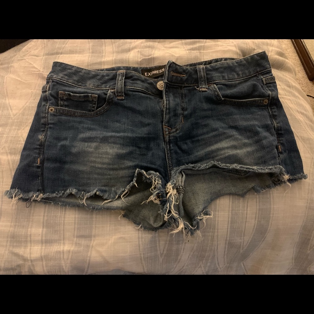 Express ripped Jean shorts. Size 8.